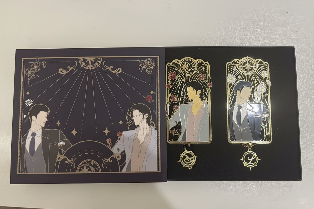 Opened Silent Reading gift box with two gold-tone metal bookmarks
