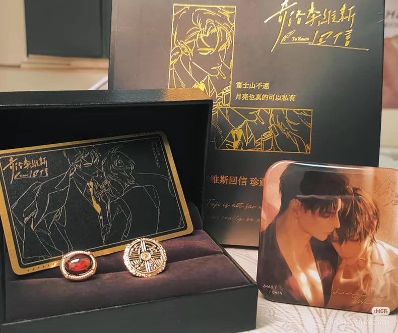 Reply to Keats Qigumi collaboration commemorative cufflinks with black and gold packaging and ruby red cufflink detail